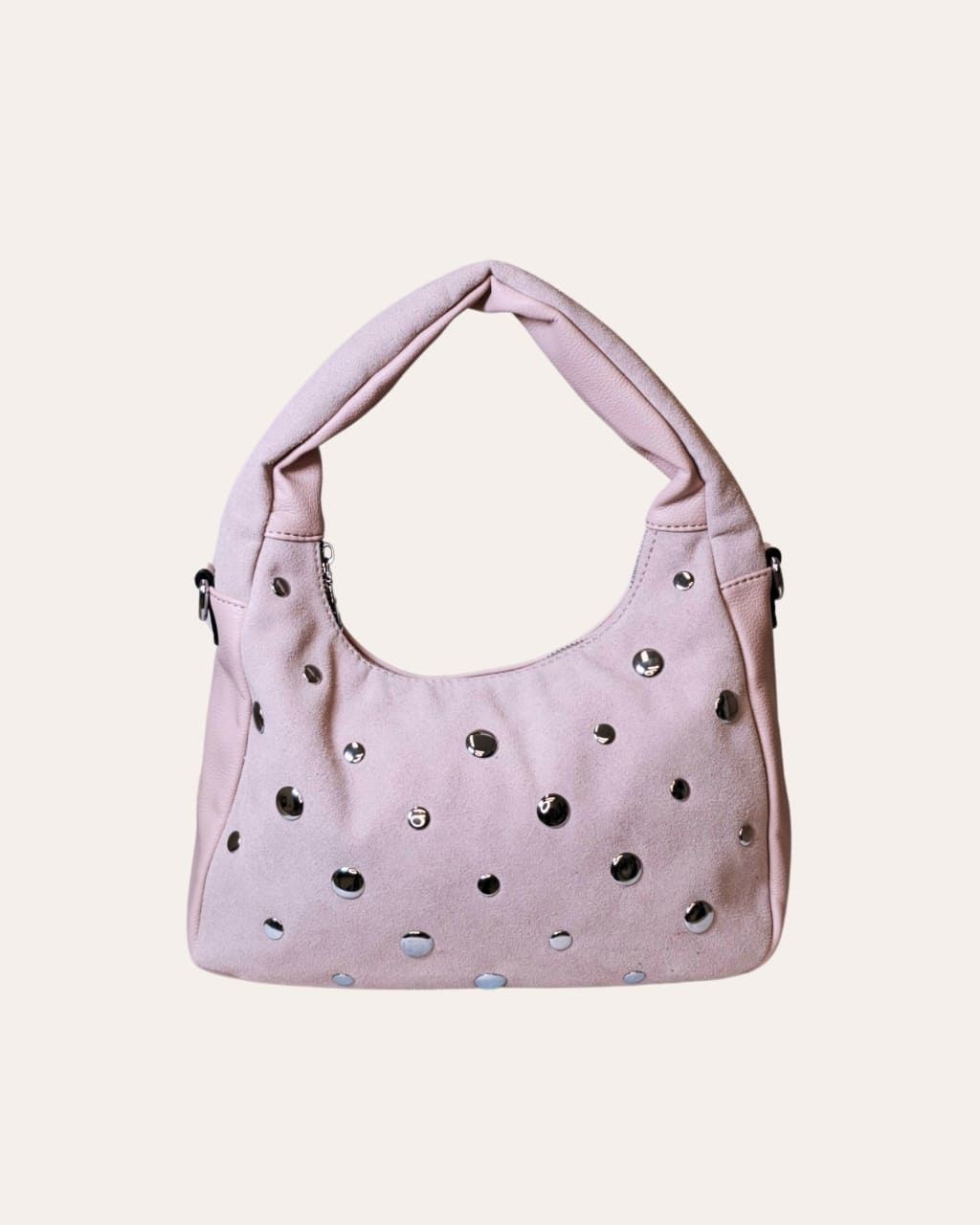 Bolso pequeño hobo con tachuelas, en color rosa palo, para primavera-verano, en AnuSska Moda.